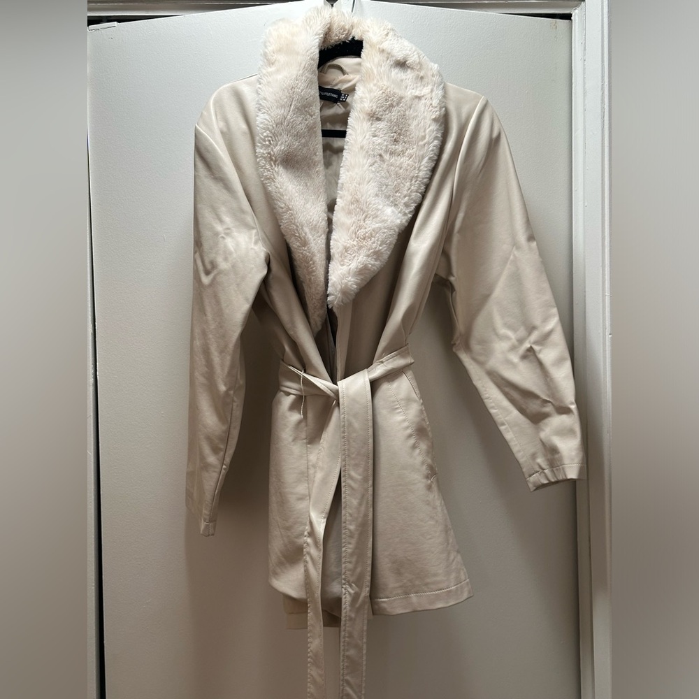 Pretty Little Thing faux leather belted trench.